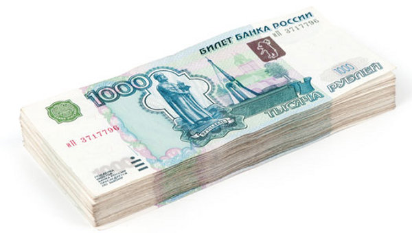 Пачка рублей на белом фоне