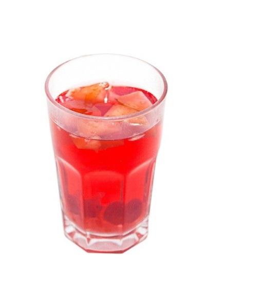 Компот в стакане на белом фоне