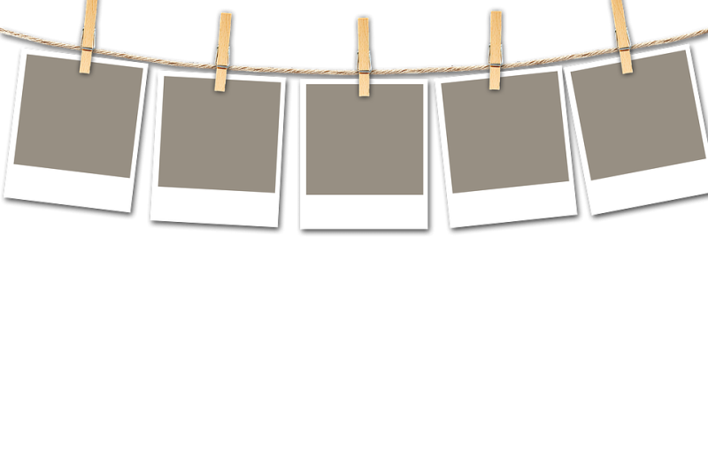Фотографии на веревке с прищепками