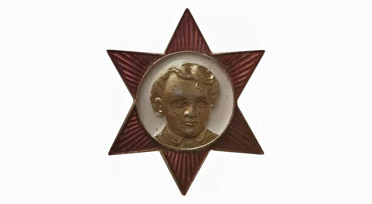 Ленин на значке октябренка