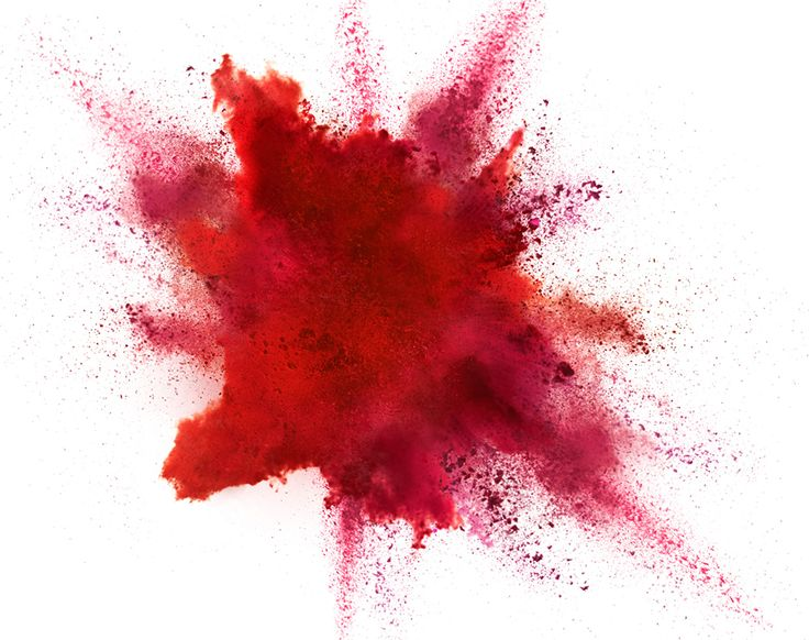 Взрыв цветного порошка на белом фоне
