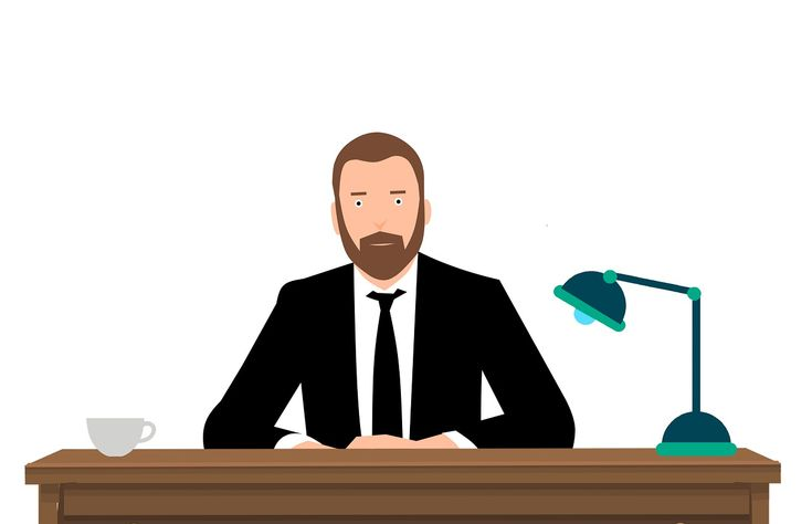 Директор за столом