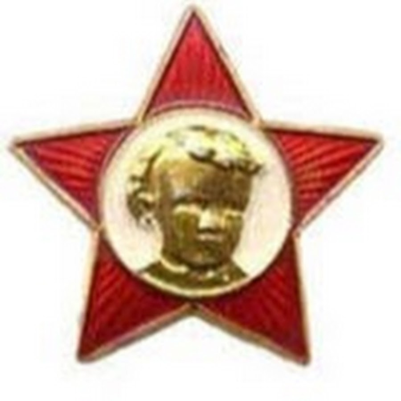 Ленин на значке октябренка